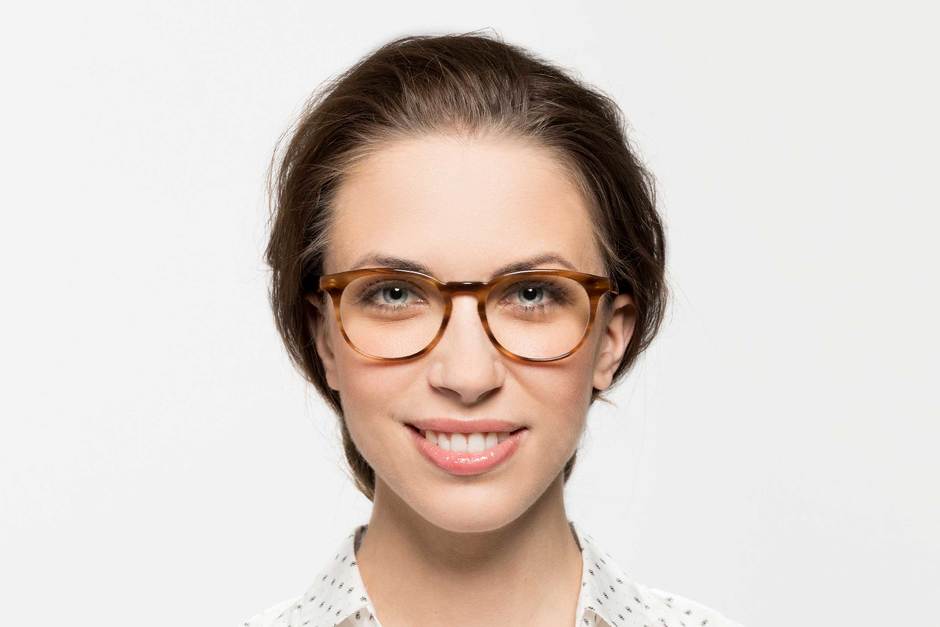 Roebling eyeglasses in amber toffee on female model viewed from front